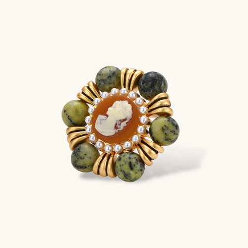 Vintage-style gold plated brooch with a cameo portrait, white bead border and six round green natural stone beads.